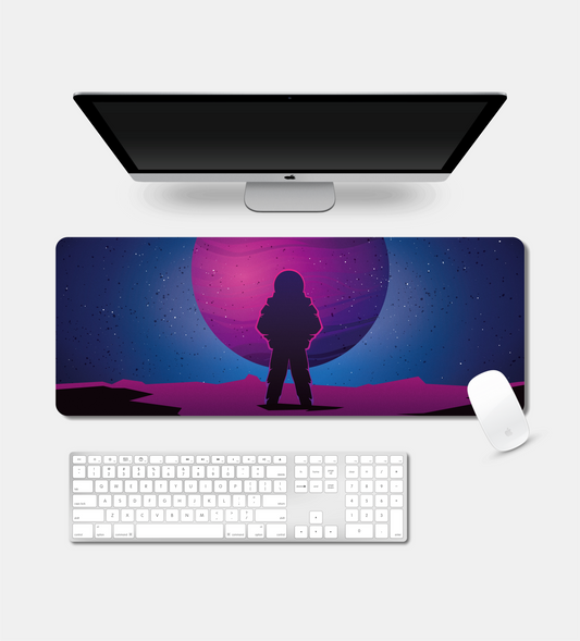 Astronaut on Alien Planet Desk Pad